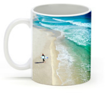Photo mug with white sandy beach and turquoise ocean waves.