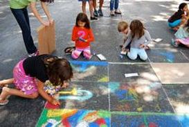 Kids street art with chaulk at the Palo Alto Art Ffestival.
