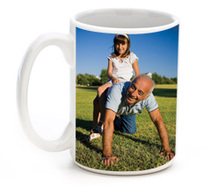 Photo mug with image of father and daughter playing in grass.