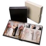 Three photo albums, including open wedding photo album.